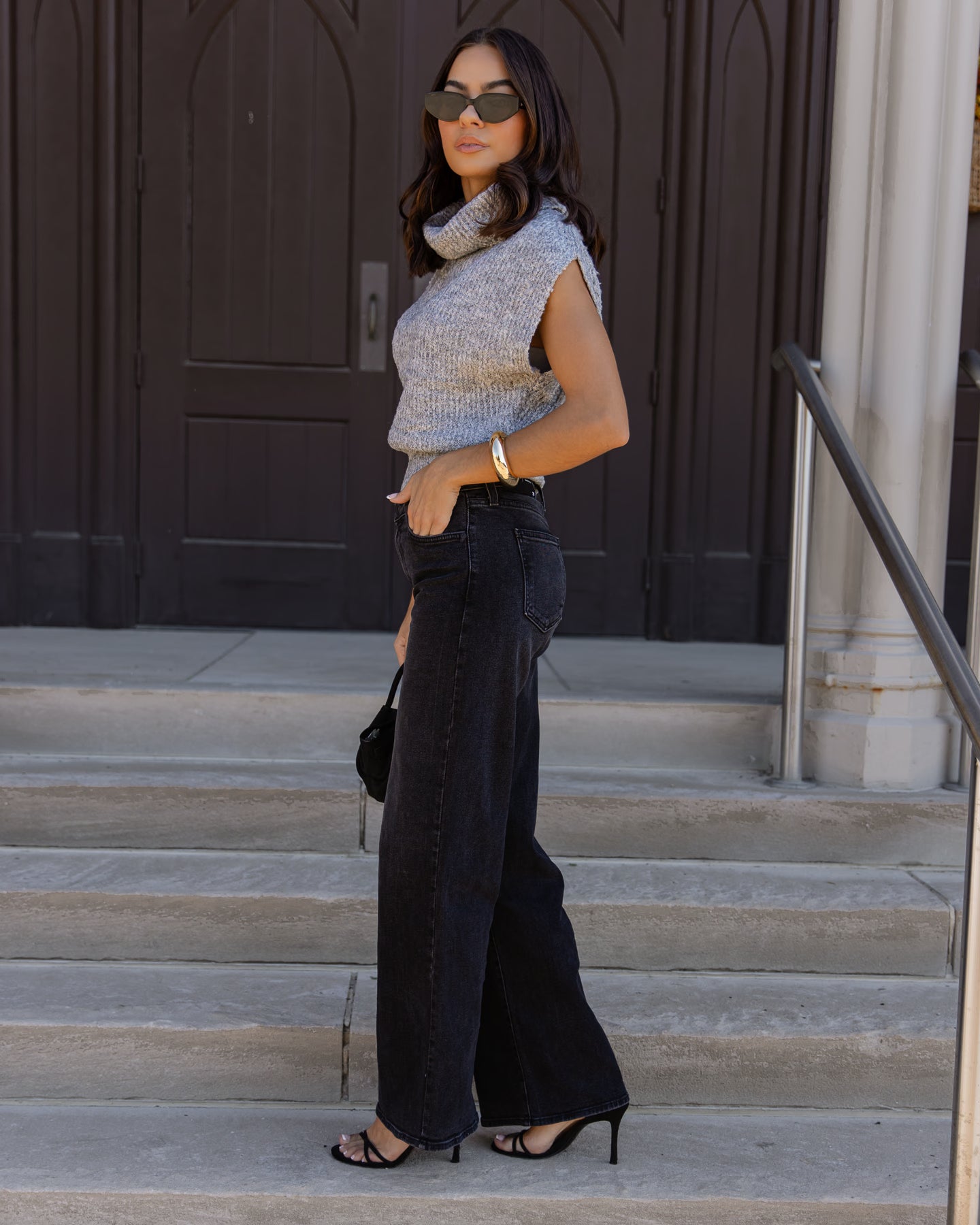Relaxed drop shoulder on a lightweight grey knit layer