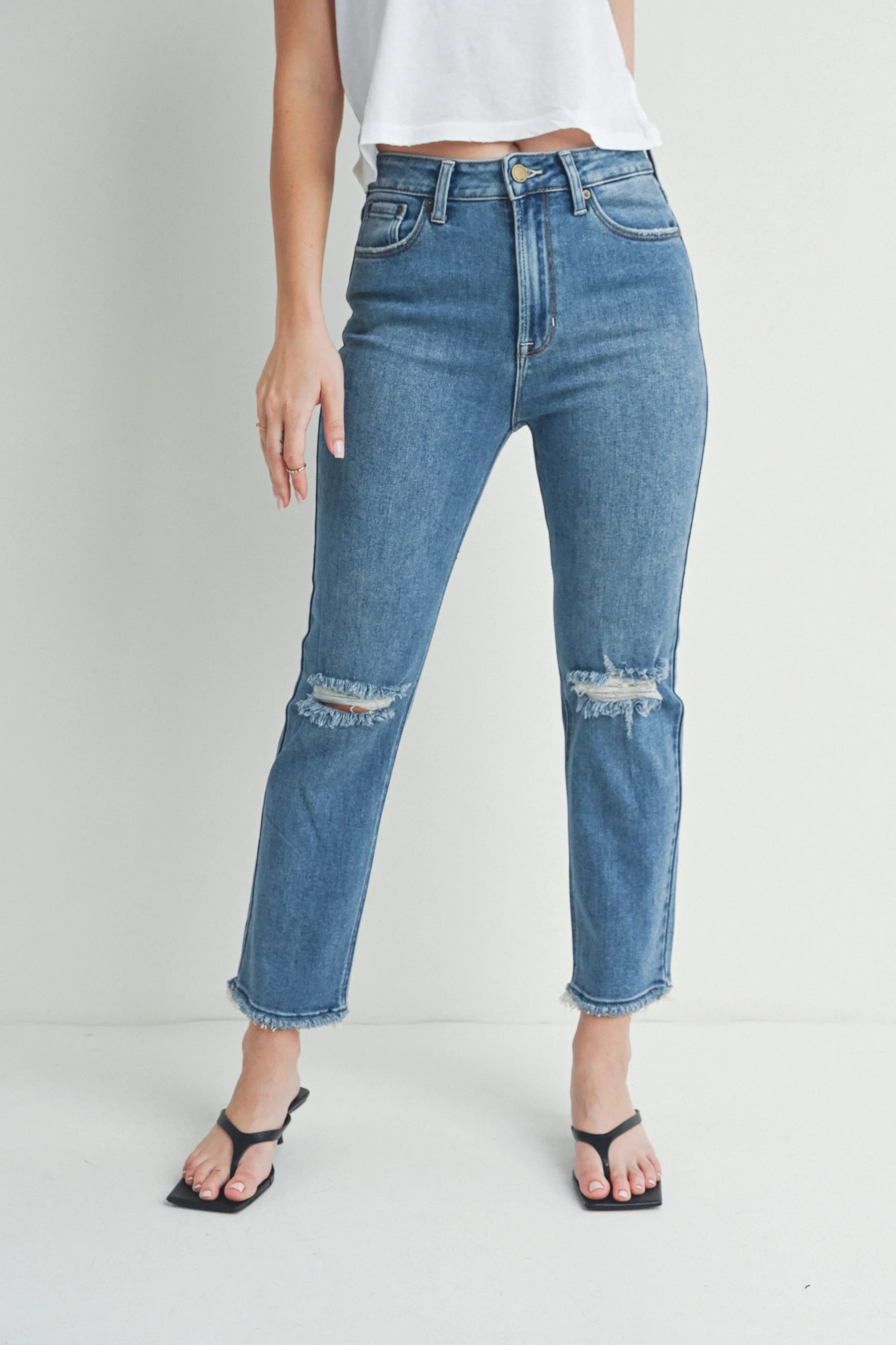 Slim straight leg relaxing slightly toward the ankle