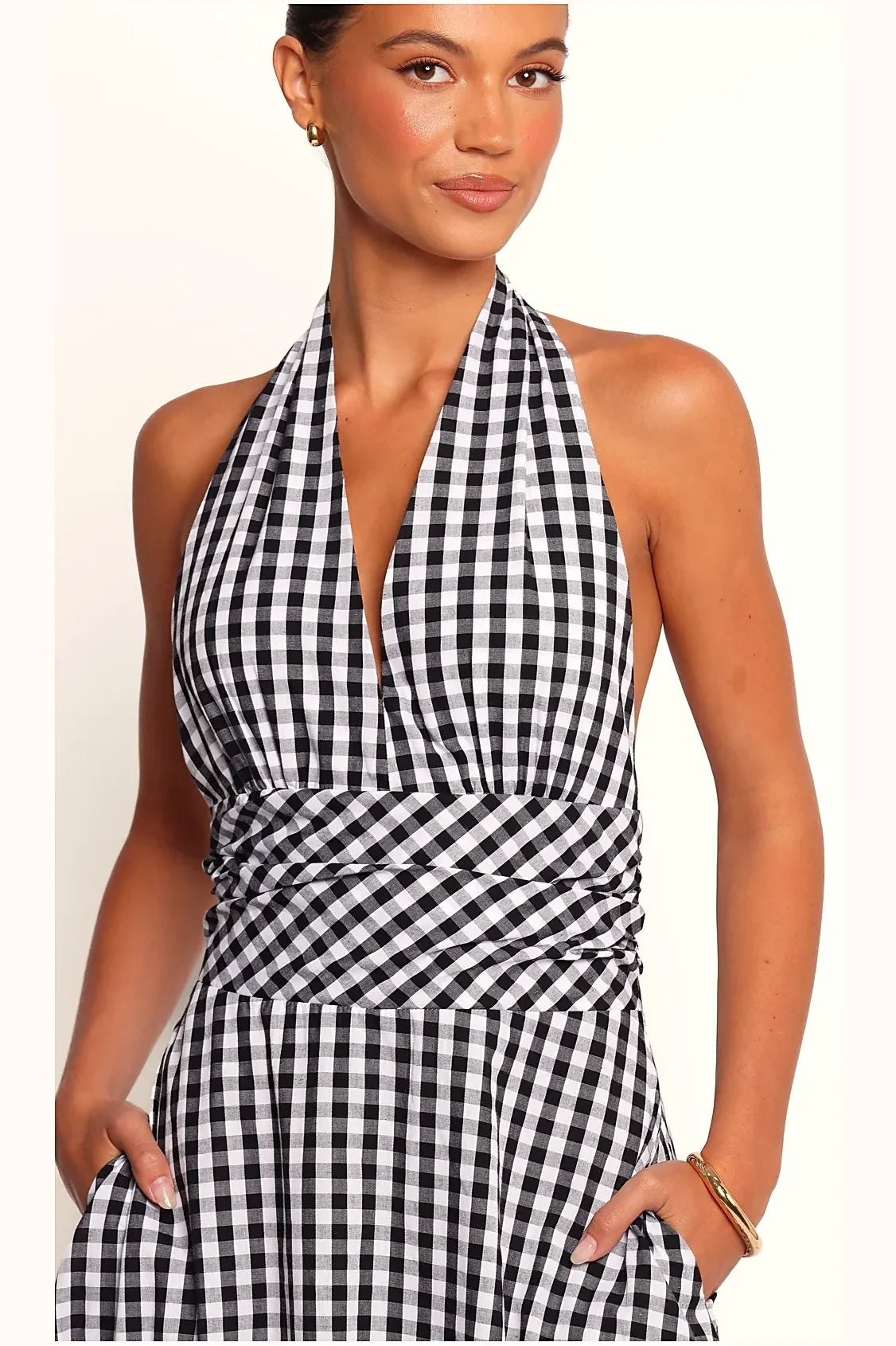 Back view of a black and white checked maxi dress