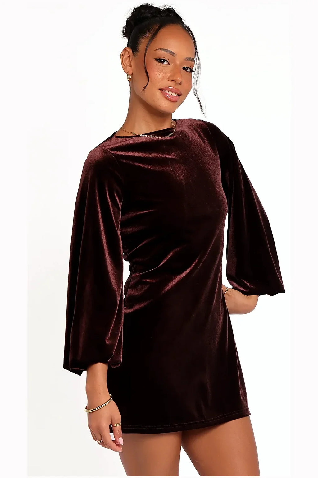 Model photo — brown velvet mini dresse, detail of the neckline