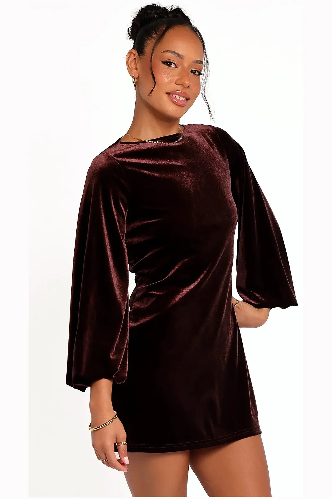 Model photo — brown velvet mini dresse, detail of the neckline