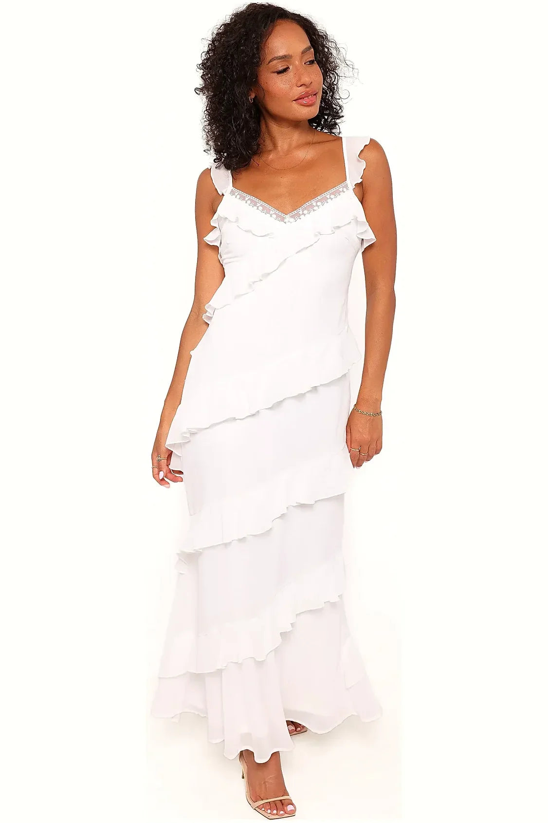 White lace maxi dress seen from the side, full length