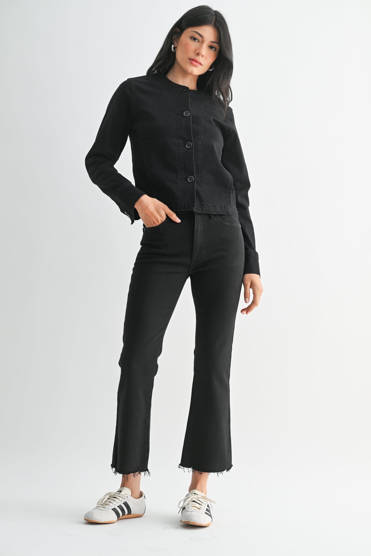 Soft flare opening from the knee on a white cropped jean