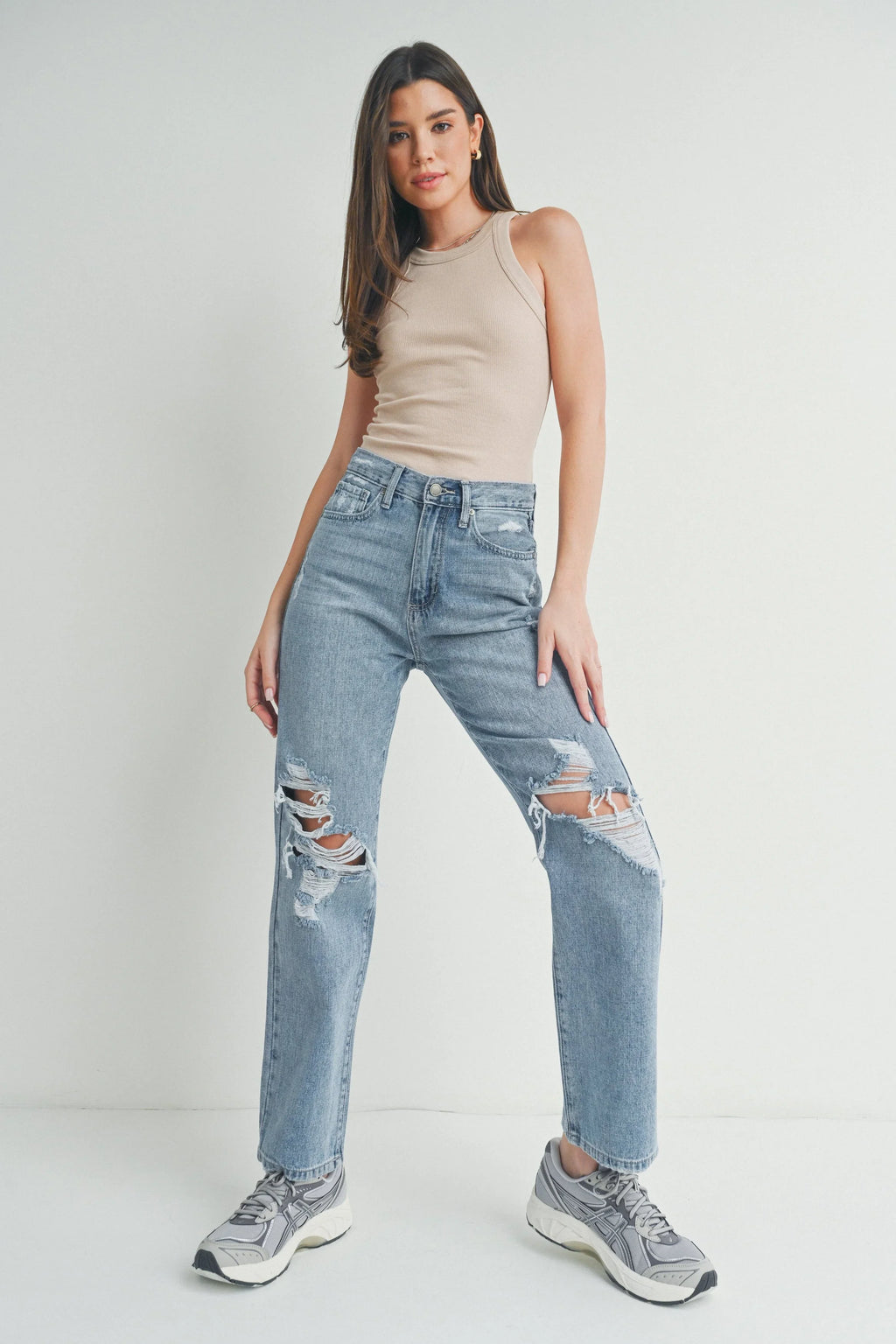 Relaxed dad jean fit through the hips and thighs