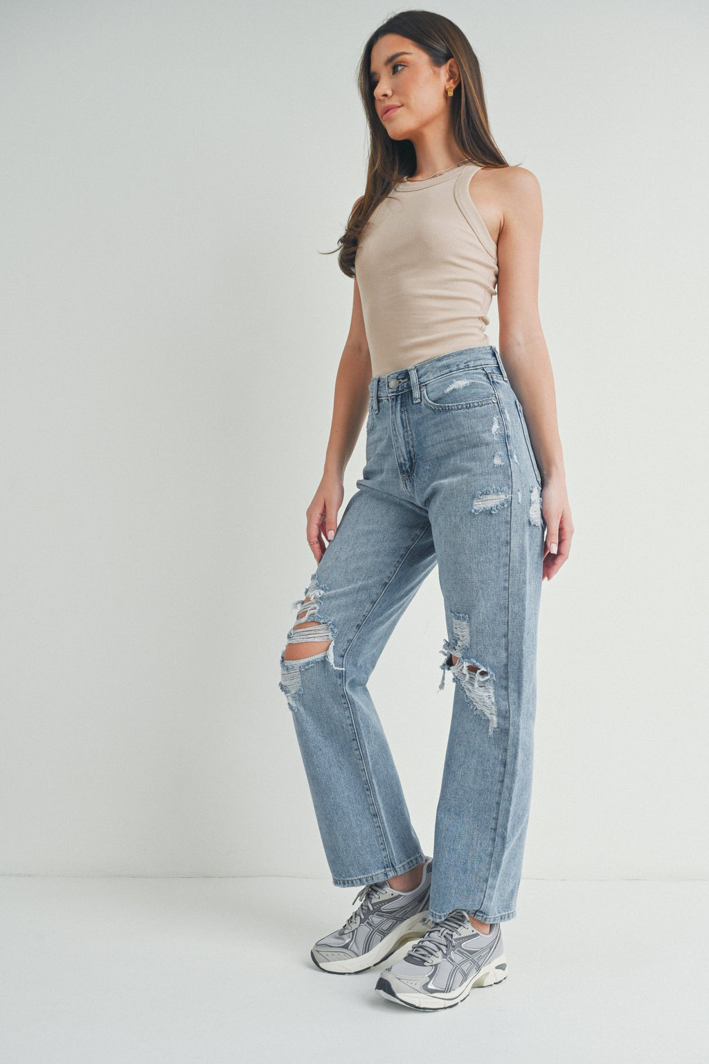 Light rinse wash with subtle distressing at the knees
