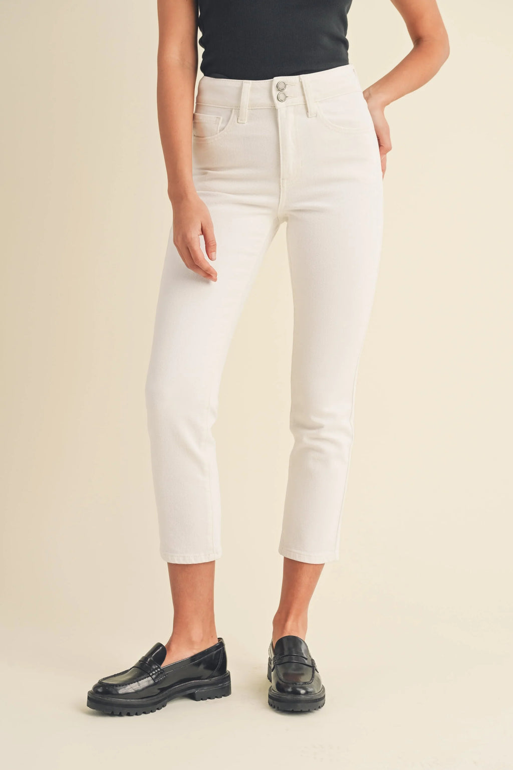 Minimal detailing on a high-rise white straight jean