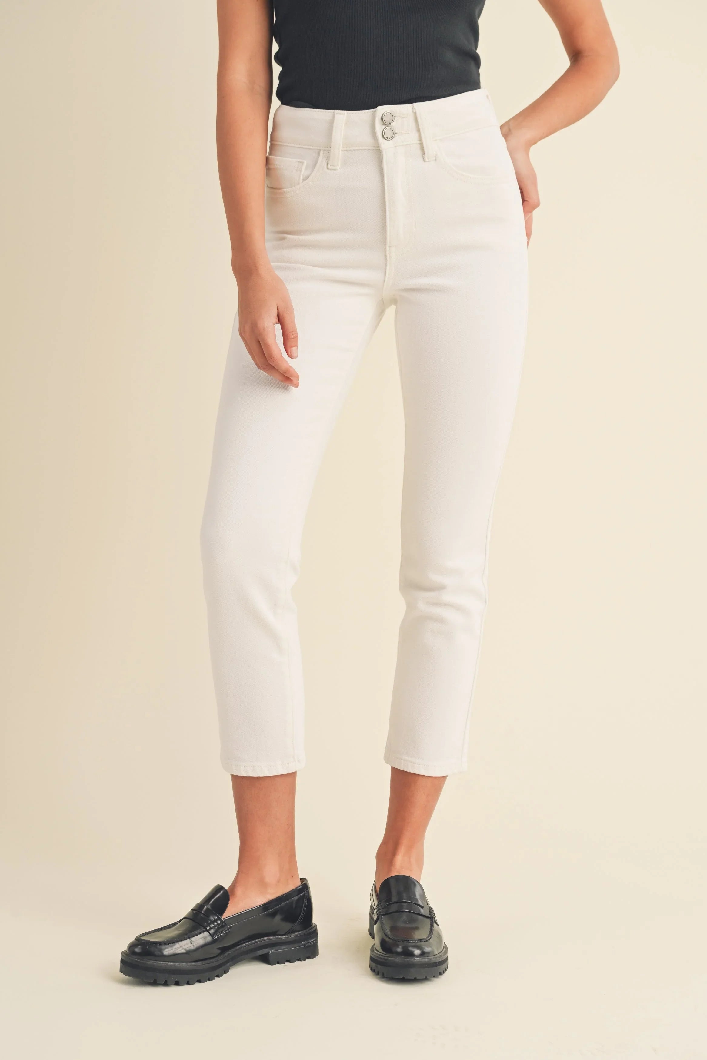 Minimal detailing on a high-rise white straight jean