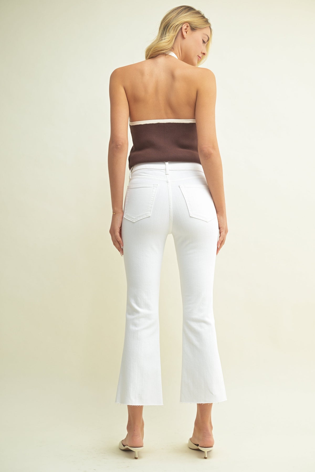 Slim fit through the hips and thighs on white stretch denim