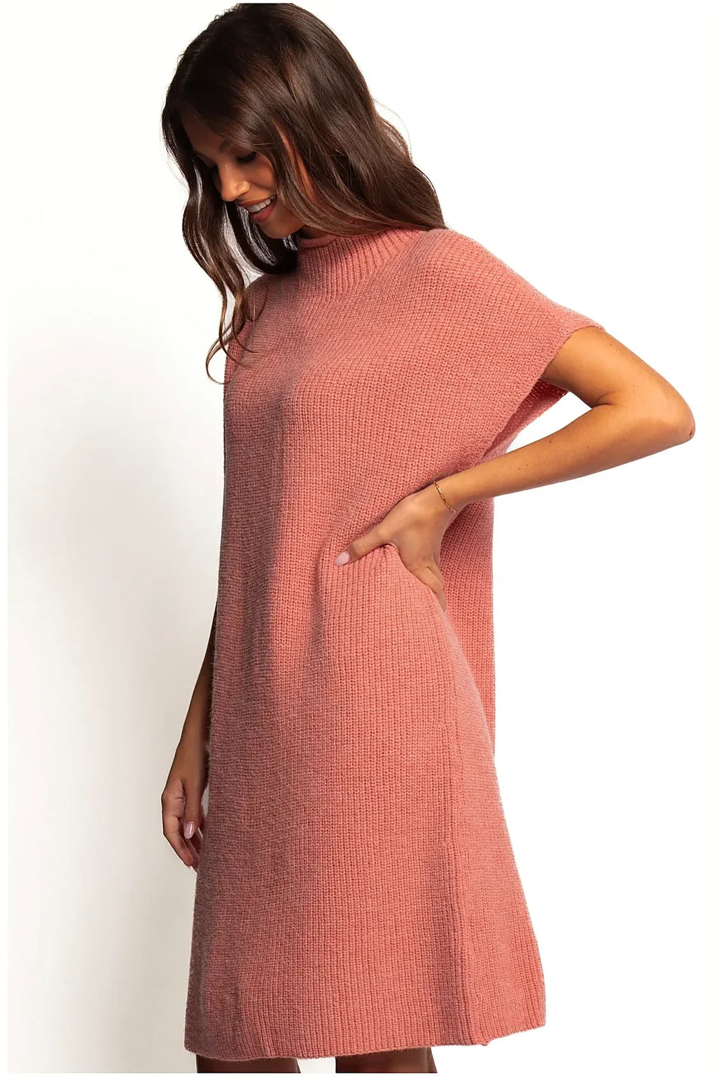 Detail of the ribbed knit texture on the pink mini dress